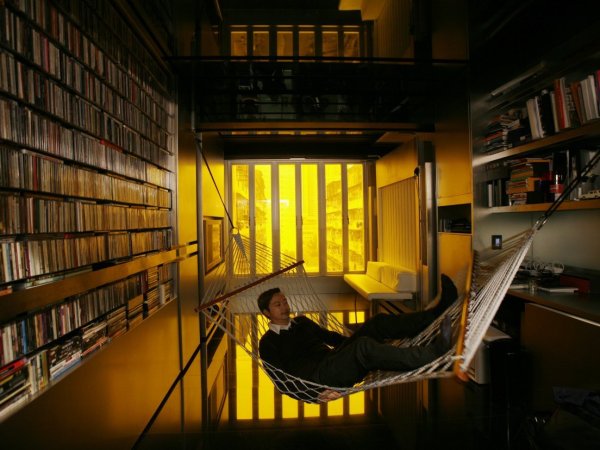 A Tiny Apartment Transforms into 24 Rooms