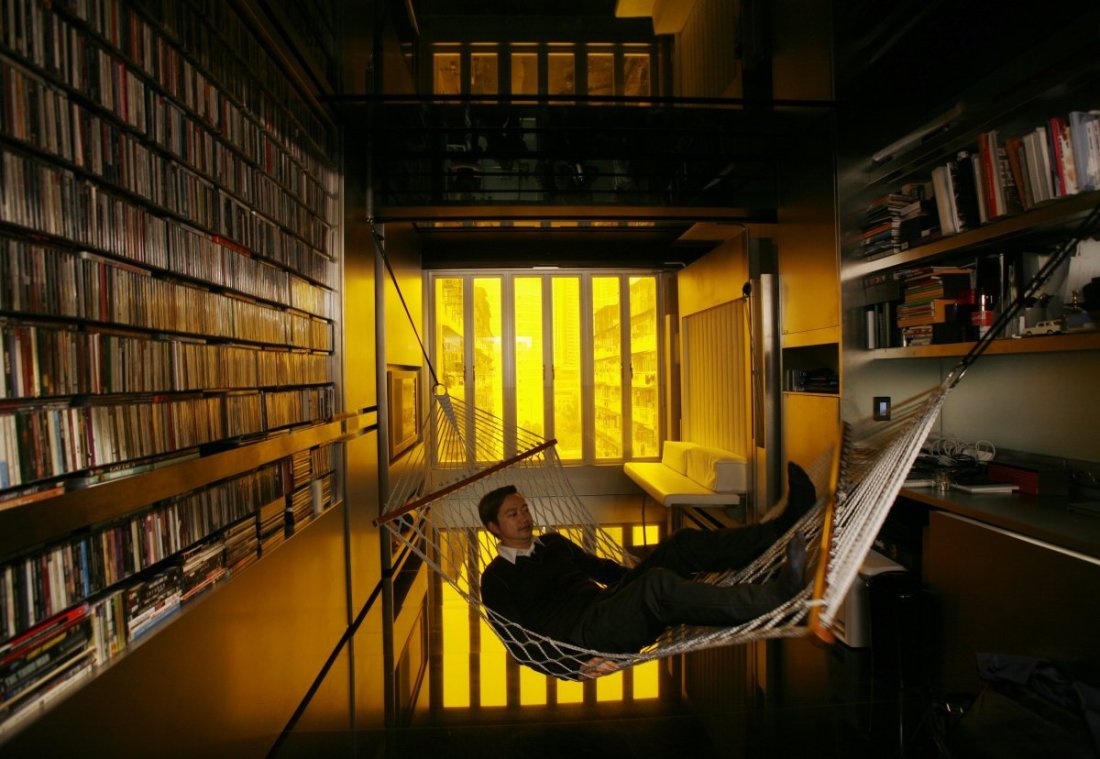 A Tiny Apartment Transforms into 24 Rooms