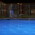 Bottle Rocket (1996) | Owen Wilson stands by pool outside motel | Director: Wes Anderson | Production Designer: David Wasco | Wes Anderson Production Design Porn