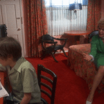 Alice Doesn't Live Here Anymore (1974) | Martin Scorsese production design | Martin Scorsese Films | Ellen Burstyn with son in hotel with red carpet
