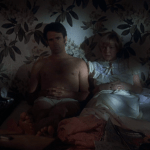 Alice Doesn't Live Here Anymore (1974) | Martin Scorsese production design | Martin Scorsese Films | Ellen Burstyn and man in bed with plant branch tropical wallpaper
