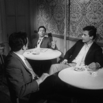 Who’s That Knocking At My Door (1967) | Martin Scorsese production design | Martin Scorsese Films | Three guys sitting at the club at two white tables
