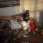 Alice Doesn't Live Here Anymore (1974) | Martin Scorsese production design | Martin Scorsese Films | Ellen Burstyn lies her head on her son's lap on couch